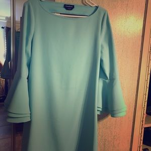 Medium light blue Bebe dress with bell sleeves